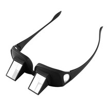 휴대용 가로 게으른 안경을 누워 침대를 읽고 고화질을보고 있습니다.