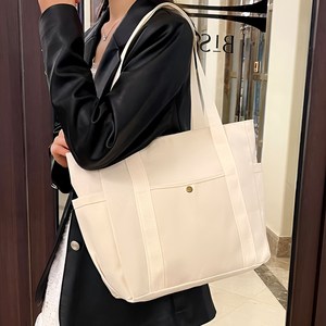 앤드류 데일리 보부상 캔버스 숄더백