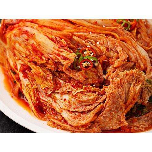 명인의 손길로 빚어낸 깊은 맛, 밥상에 행복을 더하는 명인 유정임 포기김치