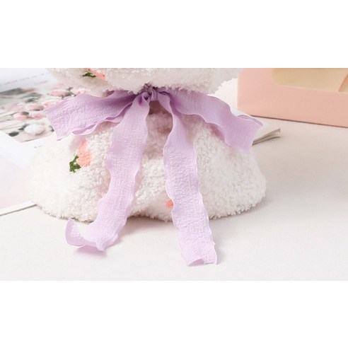 이 제품은 사랑스러운 디자인과 풍부한 색상으로 만들어진 토끼인형 꽃다발