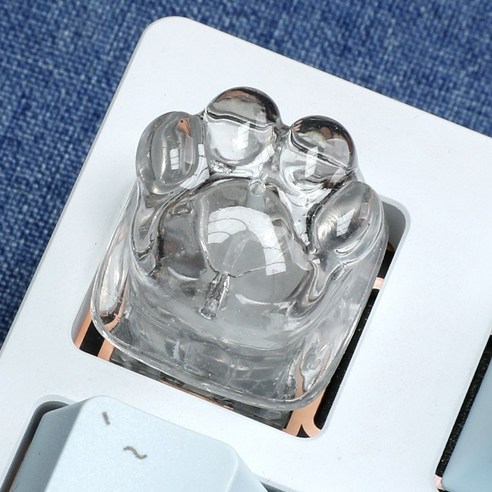 고양이 발바닥 키캡으로 키보드에 사랑스러움과 개성을 더하세요.