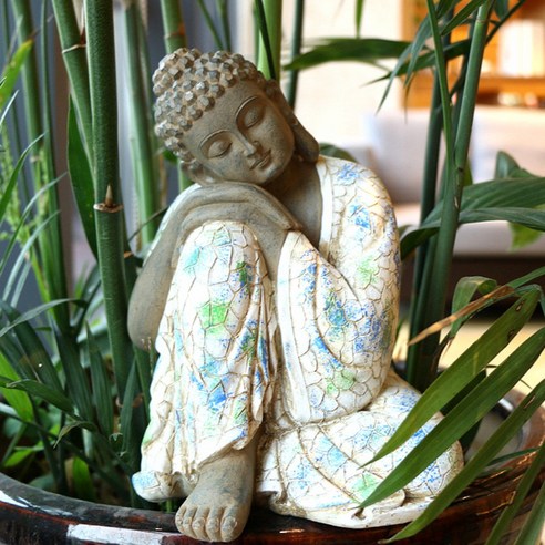 오늘 밤, 당신의 꿈속 정원을 밝혀줄 비밀: 잠자는 부처님 조각상