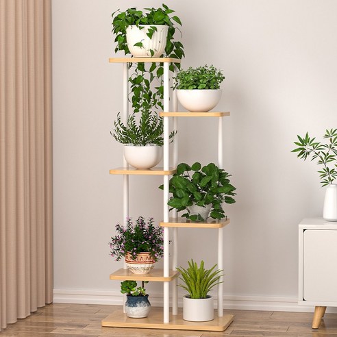 초록을 담은 공간의 미학, CK리빙 거실 화분 정리대