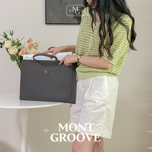 세련되고 기능적인 몽그루브 여성 서류가방으로 편안한 출퇴근을 경험하세요.